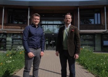 Paul Mackie and James Mallinder stood outside East Suffolk Council's Riduna Park offices